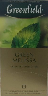 Green baikhovy tea with lemon balm and mint leaves and lemon flavor