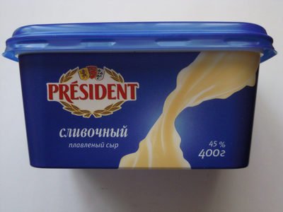 Président creamy cheese in a large jar
