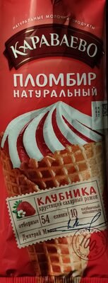 Plombir ice cream with strawberry filling in a waffle sugar cone glazed with dark chocolate